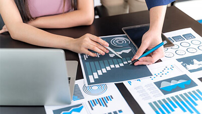 Team Reviewing Investment